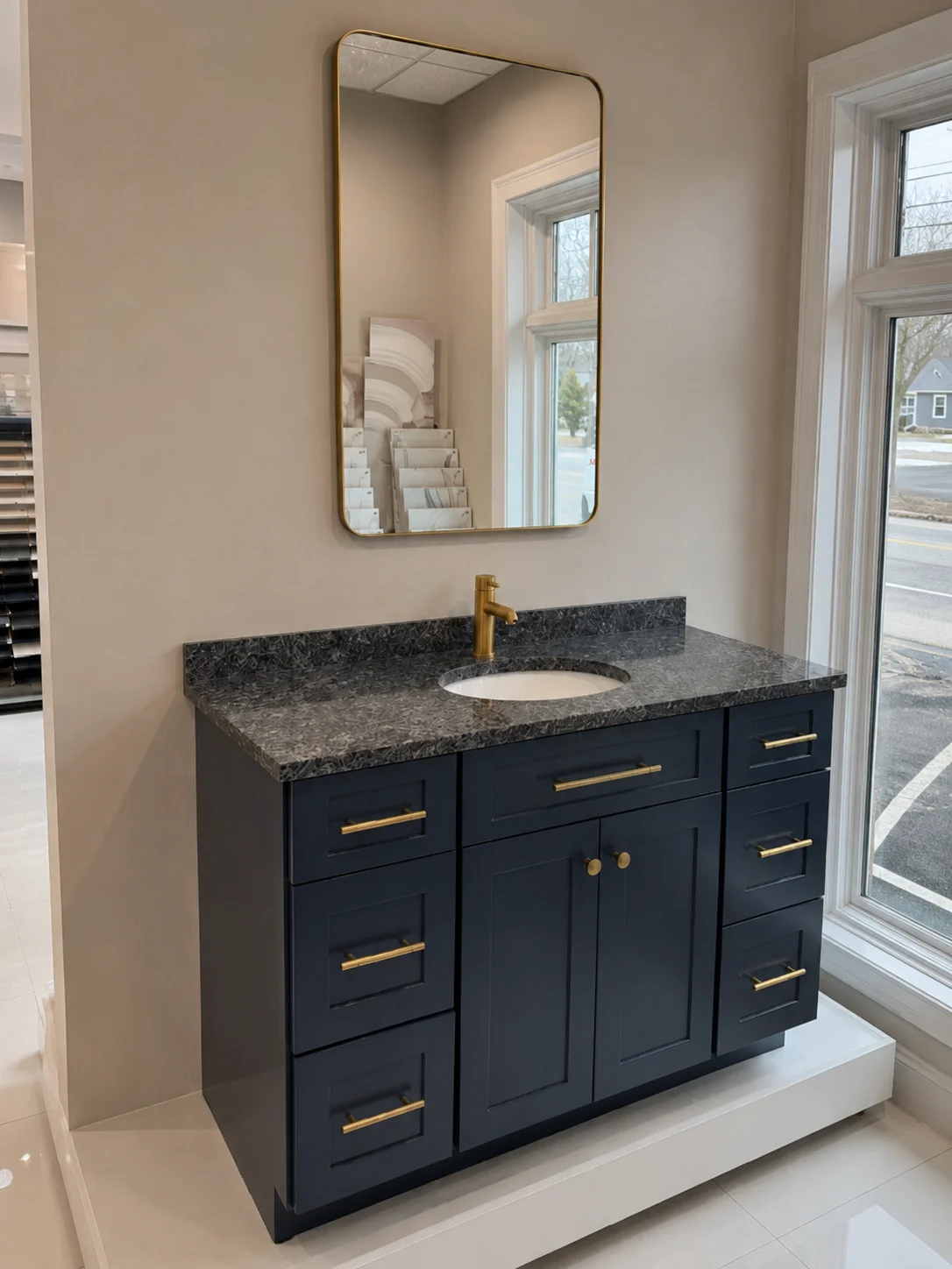 Sleek Kitchen & Bath showroom — Transitional vignette