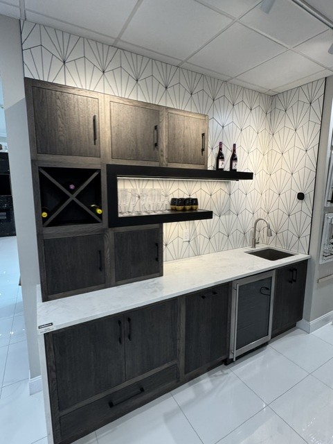 Sleek Kitchen & Bath showroom — Transitional vignette