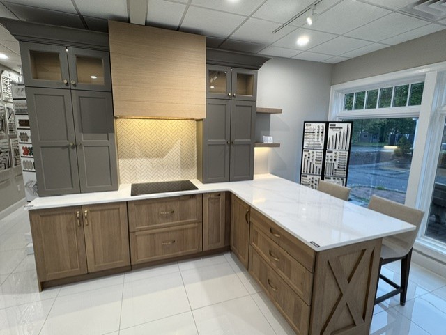 Sleek Kitchen & Bath showroom — Transitional vignette