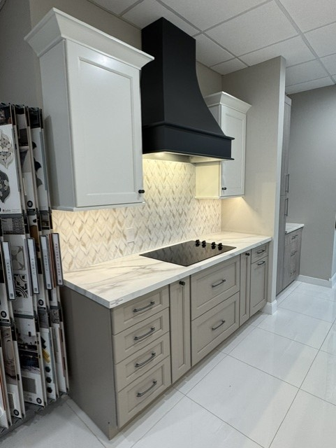 Sleek Kitchen & Bath showroom — Traditional vignette